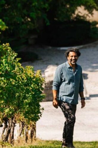 Cutting Grapes off a vine